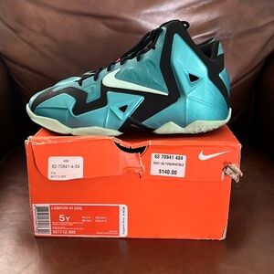 LeBron XI (GS) kid size sneakers.